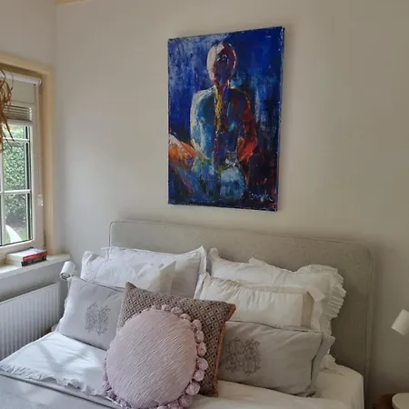 Holiday home De Bosfluiter Garderen